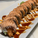 22 D.  Dragen med flambert laks | 12 STORE BITER  (G, SK, SY, E, SE)